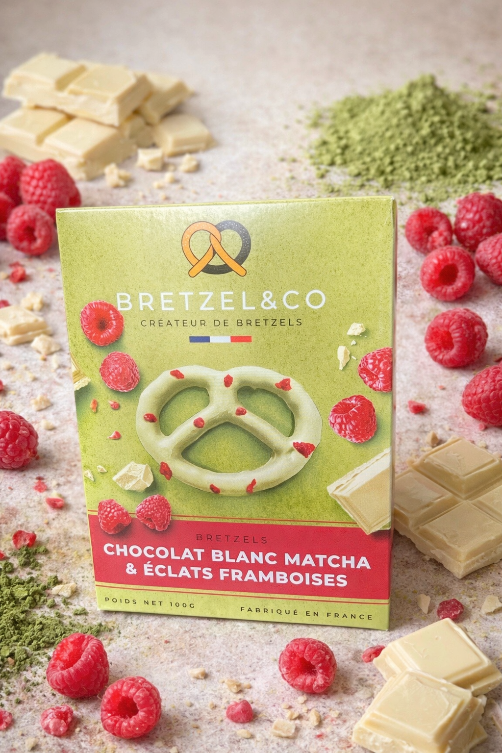 Bretzel chocolat blanc matcha - éclats de framboises - 100g